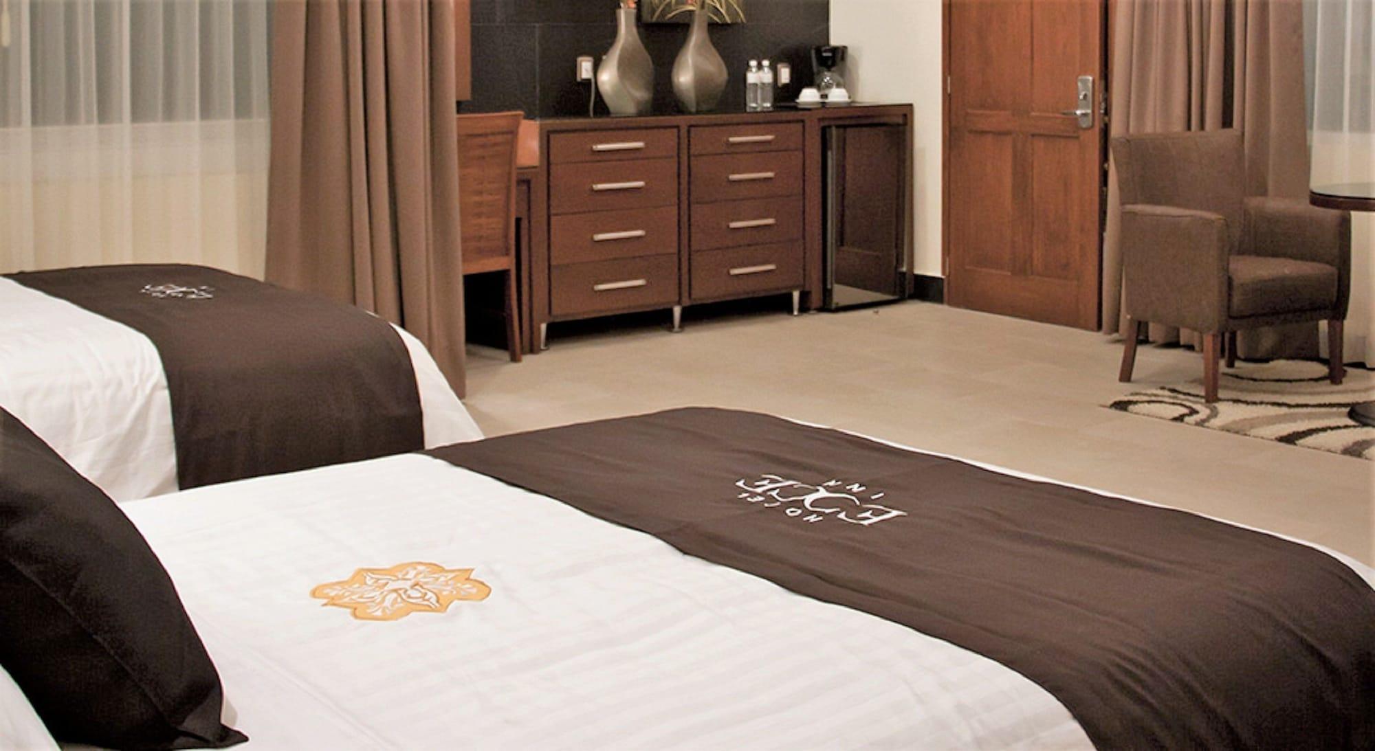 Hotel Ecce Inn & Spa Silao Exterior foto A bed runner