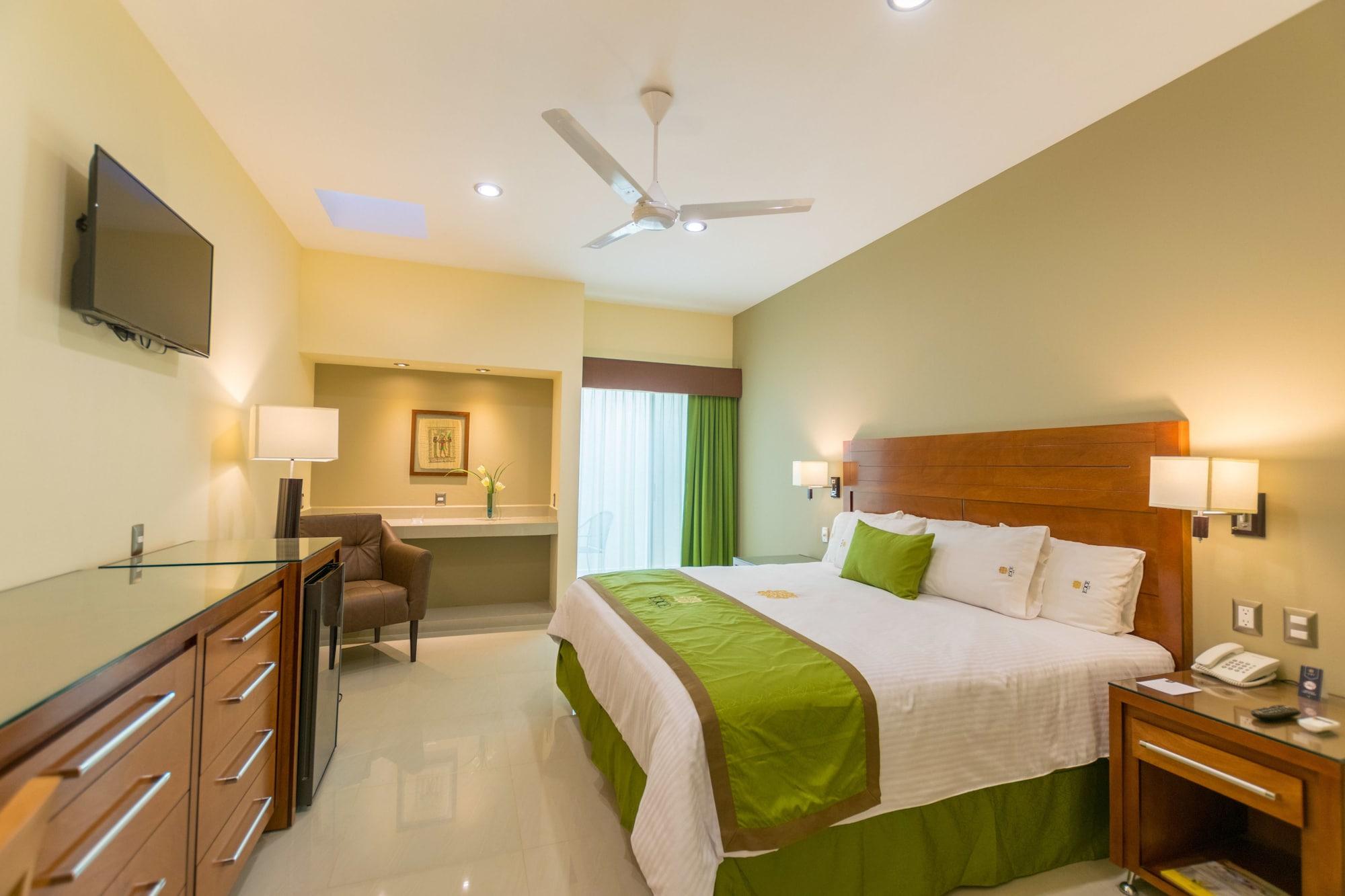 Hotel Ecce Inn & Spa Silao Exterior foto A bedroom at the hotel